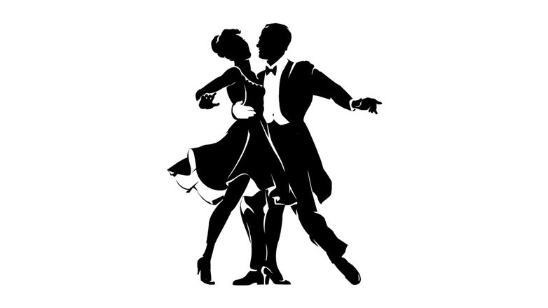 Man and woman in formalwear dancing